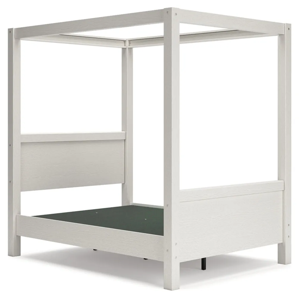 Aprilyn Full Canopy Bed with Dresser and Chest