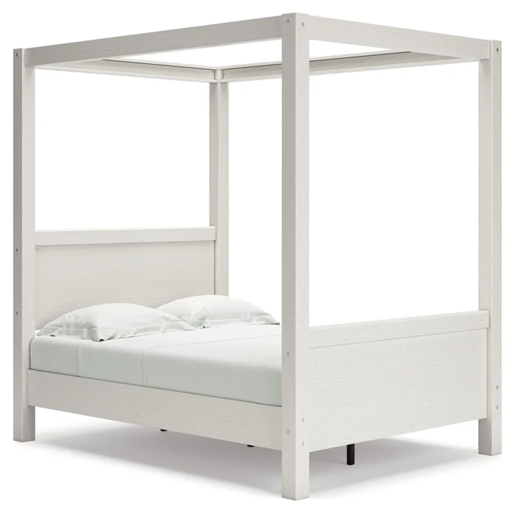 Aprilyn Full Canopy Bed with Dresser and Chest