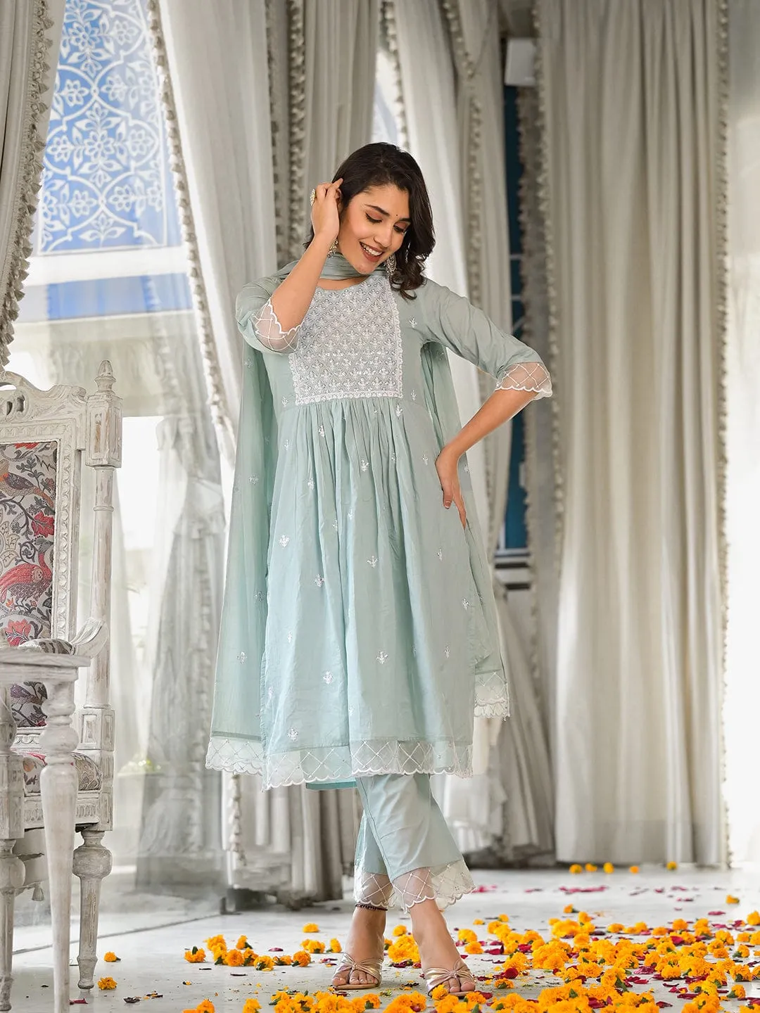 Varanga light blue embroidered three quarter sleeve straight kurta with tonal bottom and tonal dupatta.